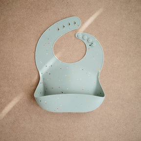 Mushie Silikon Bib Haklapp Cambridge Blue Confetti