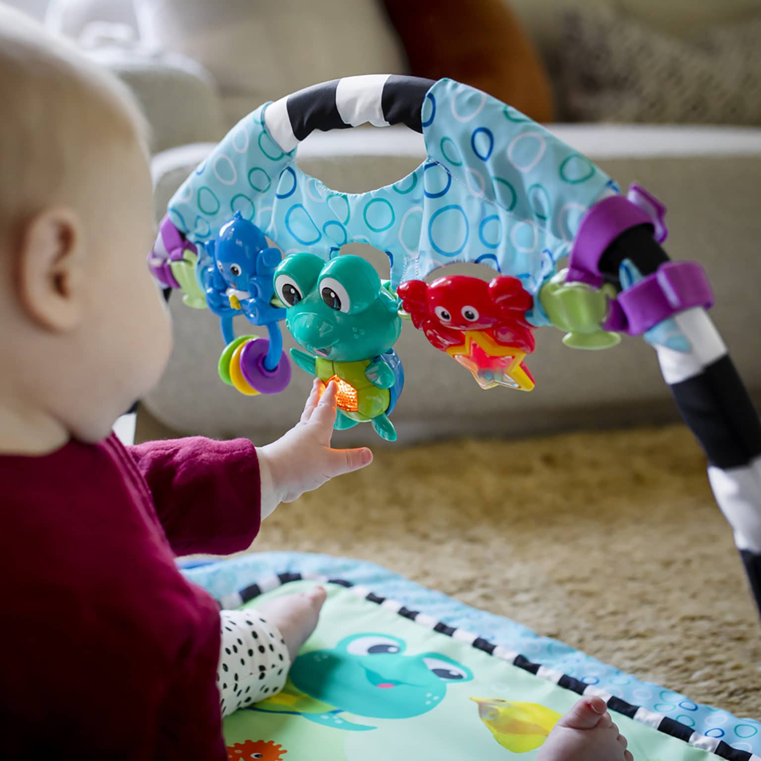 Baby Einstein Neptune's Discovery Reef™ lekmatta Babygym med avtagbar leksaksranka